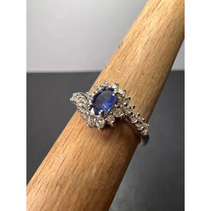 Blue sapphire and zircon floral ring in platinum over sterling silver size 5